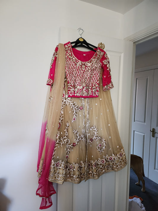 Stunning pink and gold lengha