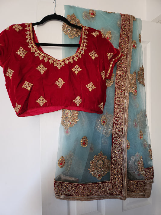 Stunning sky blue and red sari