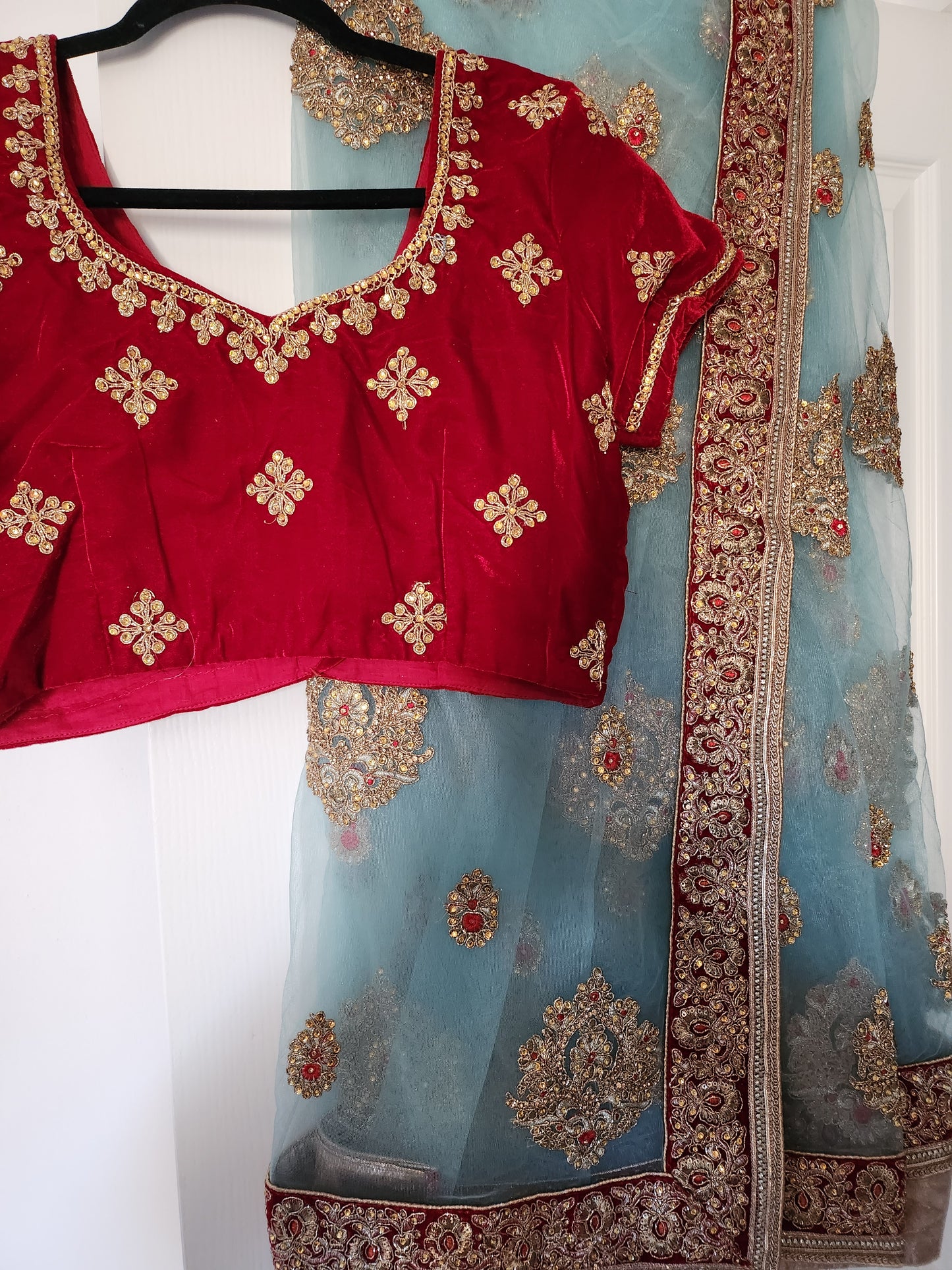 Stunning sky blue and red sari