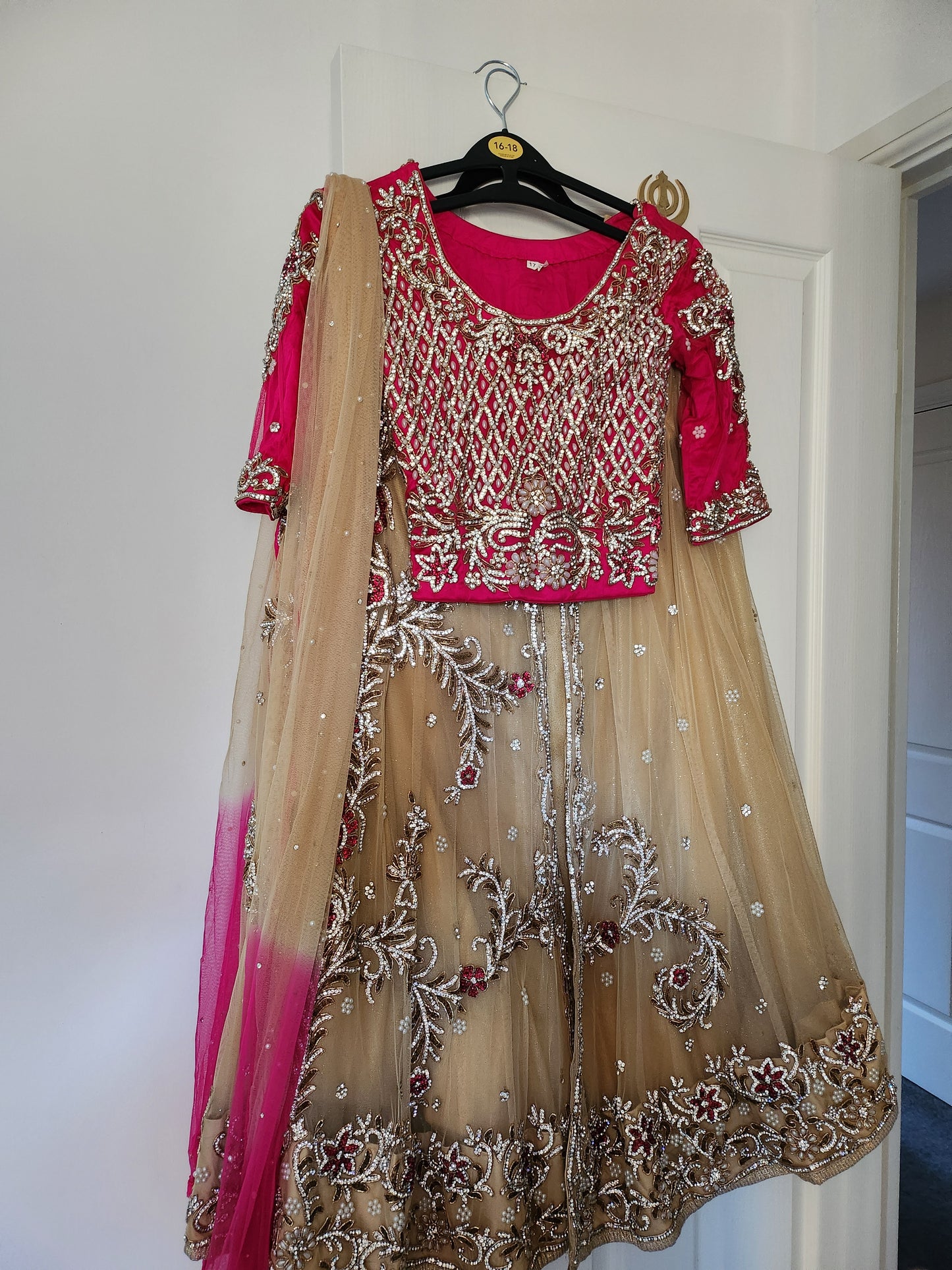 Stunning pink and gold lengha