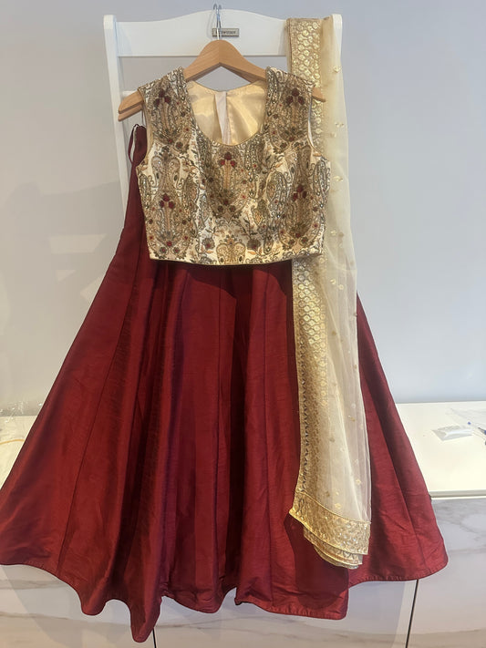 Classic preloved burgundy lehenga with cream embroidered top and cream chunni
