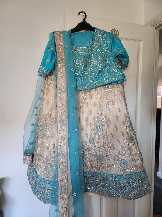 Stunning sky blue and cream lengha