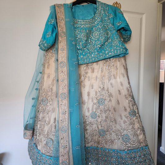 Stunning sky blue and cream lengha