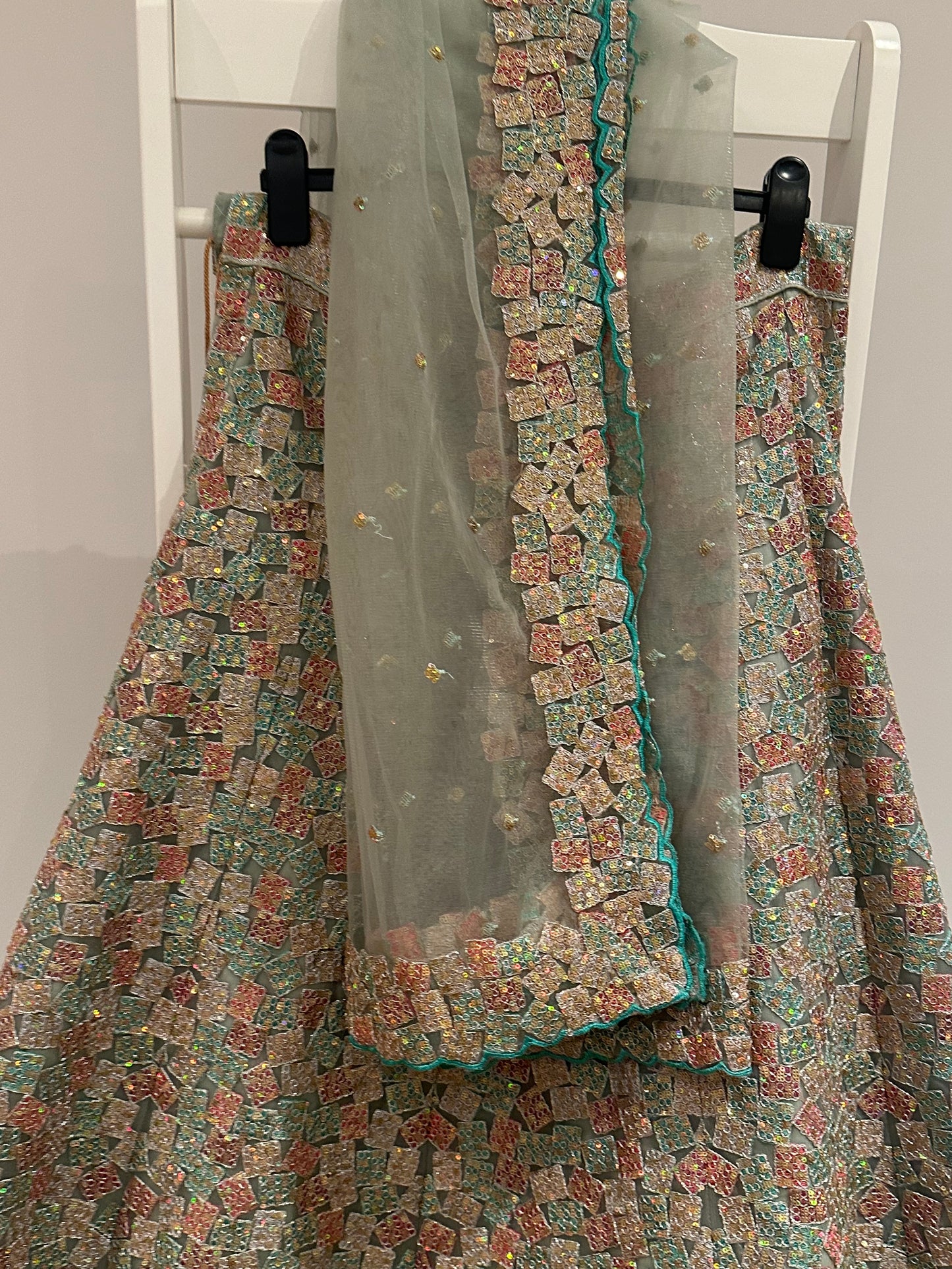 Mint green lehenga with two blouses