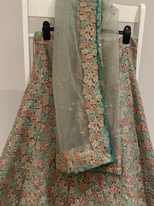 Mint green lehenga with two blouses