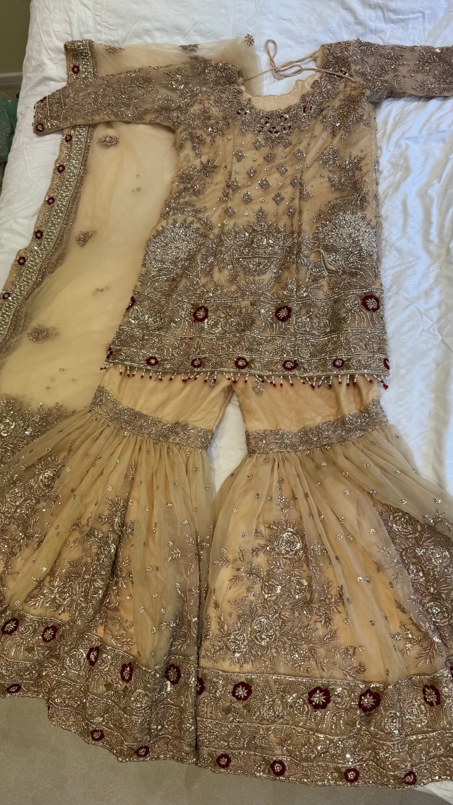 Mongas champagne, nude, gold gharara with red olive accents